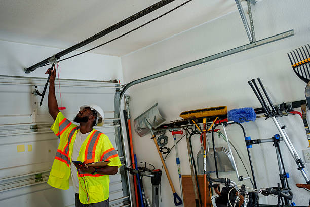 Professional Garage Door Panel Replacement technician working in Iron Mountain, MI